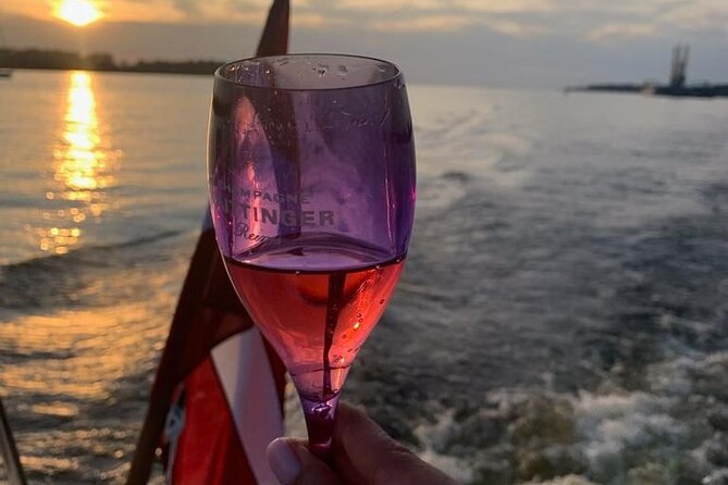 Riga: Evening or Sunset Boat Tour with Drink and Audio Guide - The first part of the ride: canals and close city views
