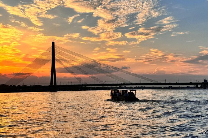Riga: Evening or Sunset Boat Tour with Drink and Audio Guide - Landmarks to watch for from the boat