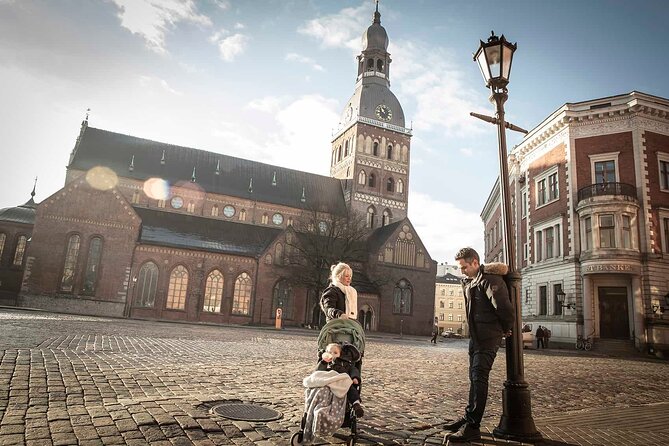 Riga Private Photoshoot Tour - Laima Clock, Freedom Monument, and the Opera