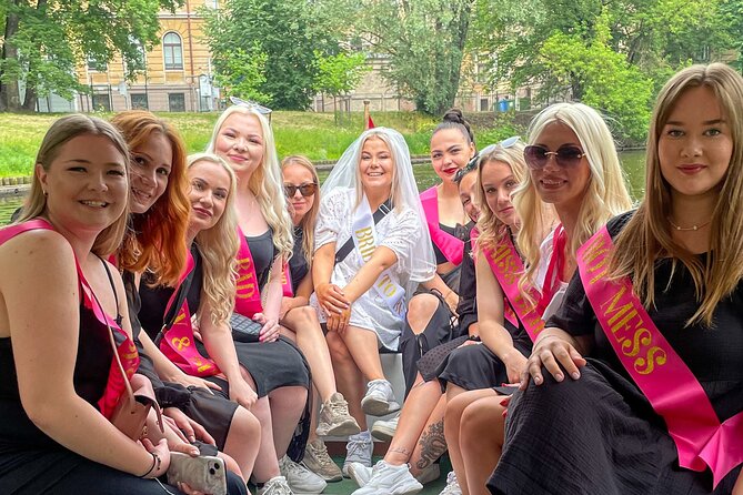 Riga Sightseeing Tour by Canal Boat with Audioguide - Through the Stockmann tunnel and toward the river