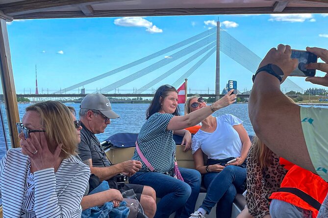 Riga Sightseeing Tour by Canal Boat with Audioguide - Kipsala, wooden houses, and Vansu Bridge
